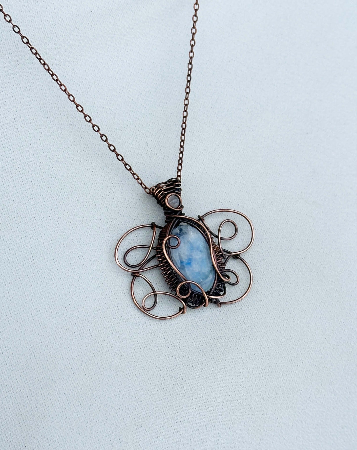 White Ermine Moth Symbol Rainbow Moonstone & Clear Quartz Accent Crystal Copper Pendant